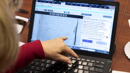 Woman typing on laptop