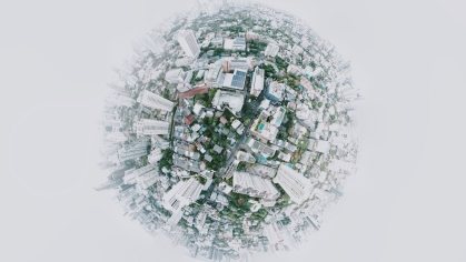 A digital image of the globe with buildings and structures extending from it