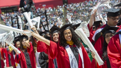 Graduates from the School of Arts and Sciences cheering at the end of the Rutgers’ 257th Anniversary Commencement.