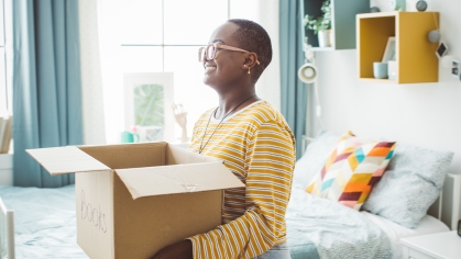 female college student moving into dorm