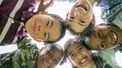 group of diverse children smiling