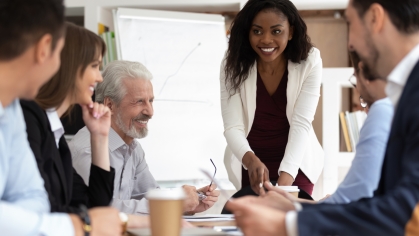 woman leading business meeting