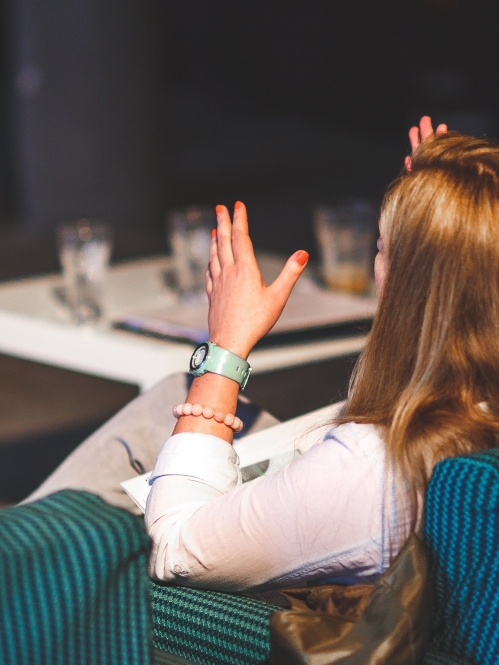 woman talking in conference breakout room