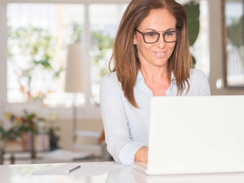 Woman with white laptop