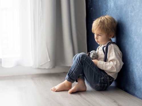 Child sitting on floor